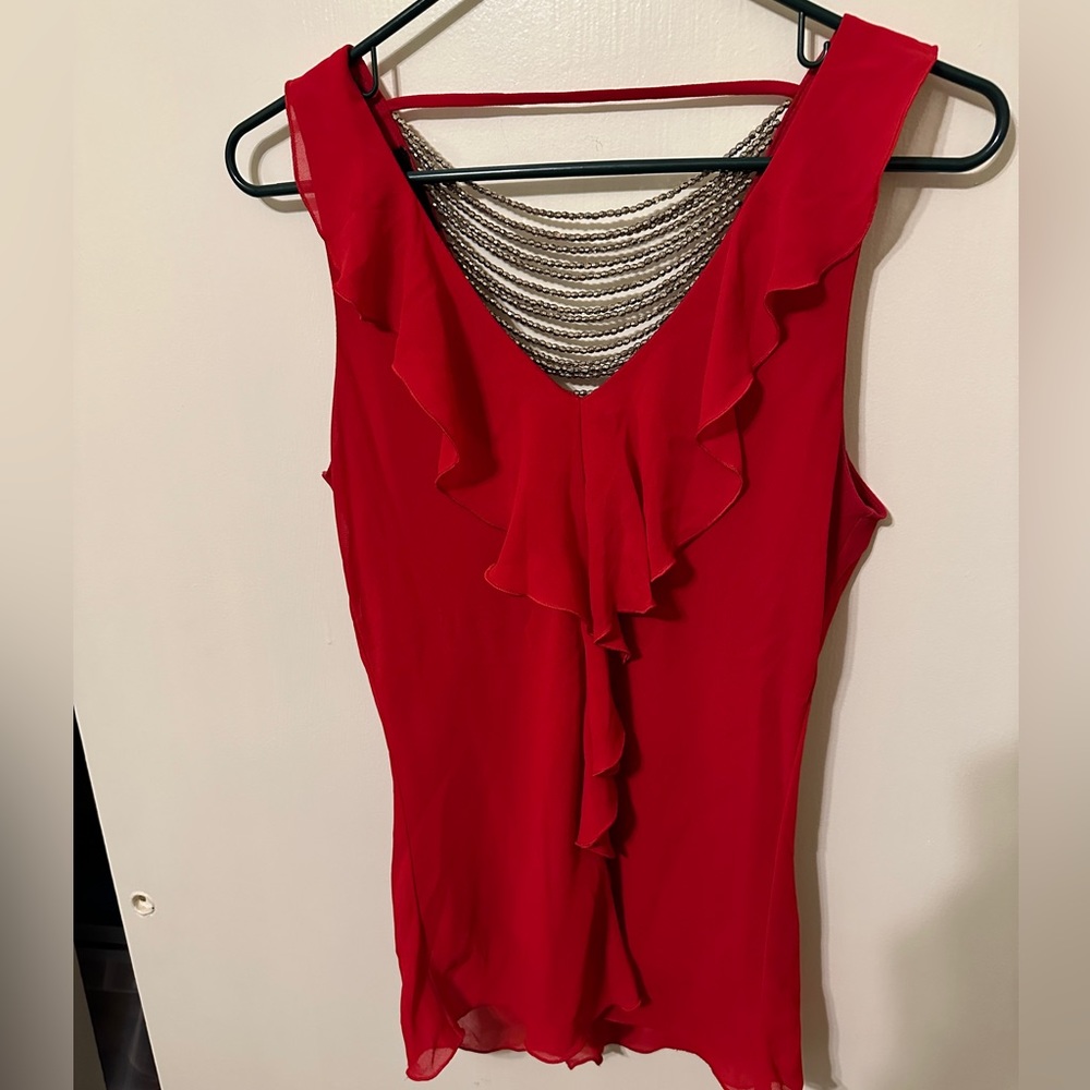 Red sleeveless blouse